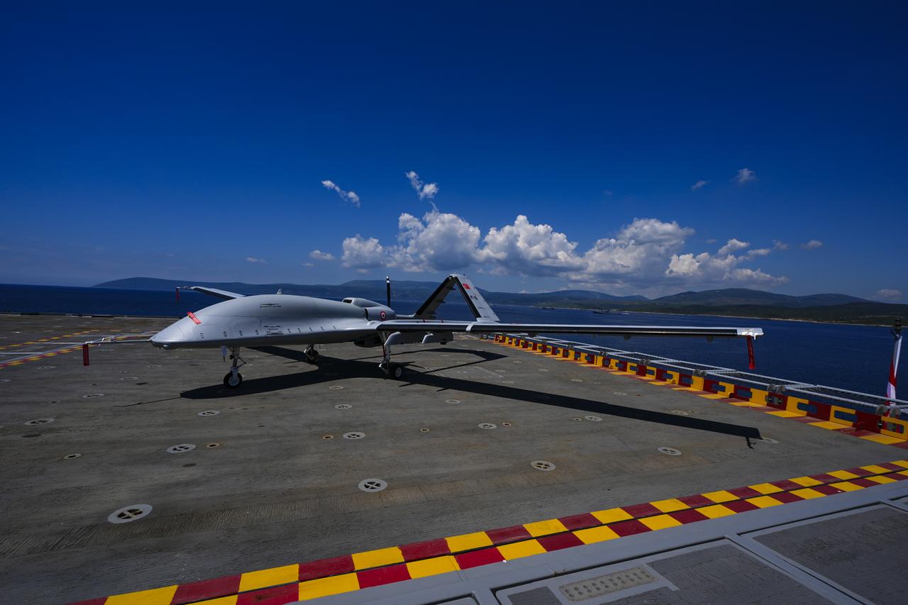 Bayraktar TB3 Unmanned Aerial Vehicle (UAV) is transported to the flight deck via elevator after inspection during exercise in Urla district of Izmir, Türkiye, May 15, 2026. (AA Photo)