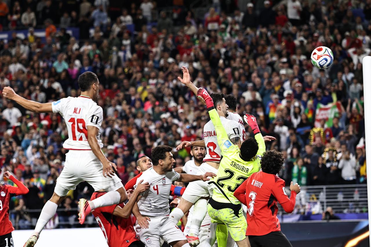 Mostafa Oufa Shobeir (23) of Egypt in action against
Mohammad Mohebi (8) of Iran during the 2026 FIFA World Cup First Stage Group G match between Egypt and IR Iran at Lumen Field (Seattle Stadium) in Seattle, Washington, United States, June 26, 2026. (AA Photo)