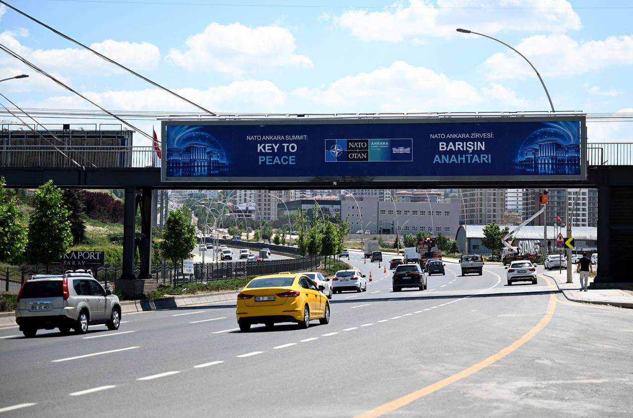 Billboards bearing the slogans “Key to Peace,” “Key to Security,” and “Shared Future in Peace” are seen at various points along the boulevard on the protocol route ahead of the NATO Summit as preparations continue in Ankara, Türkiye, on June 25, 2026. (AA Photo)