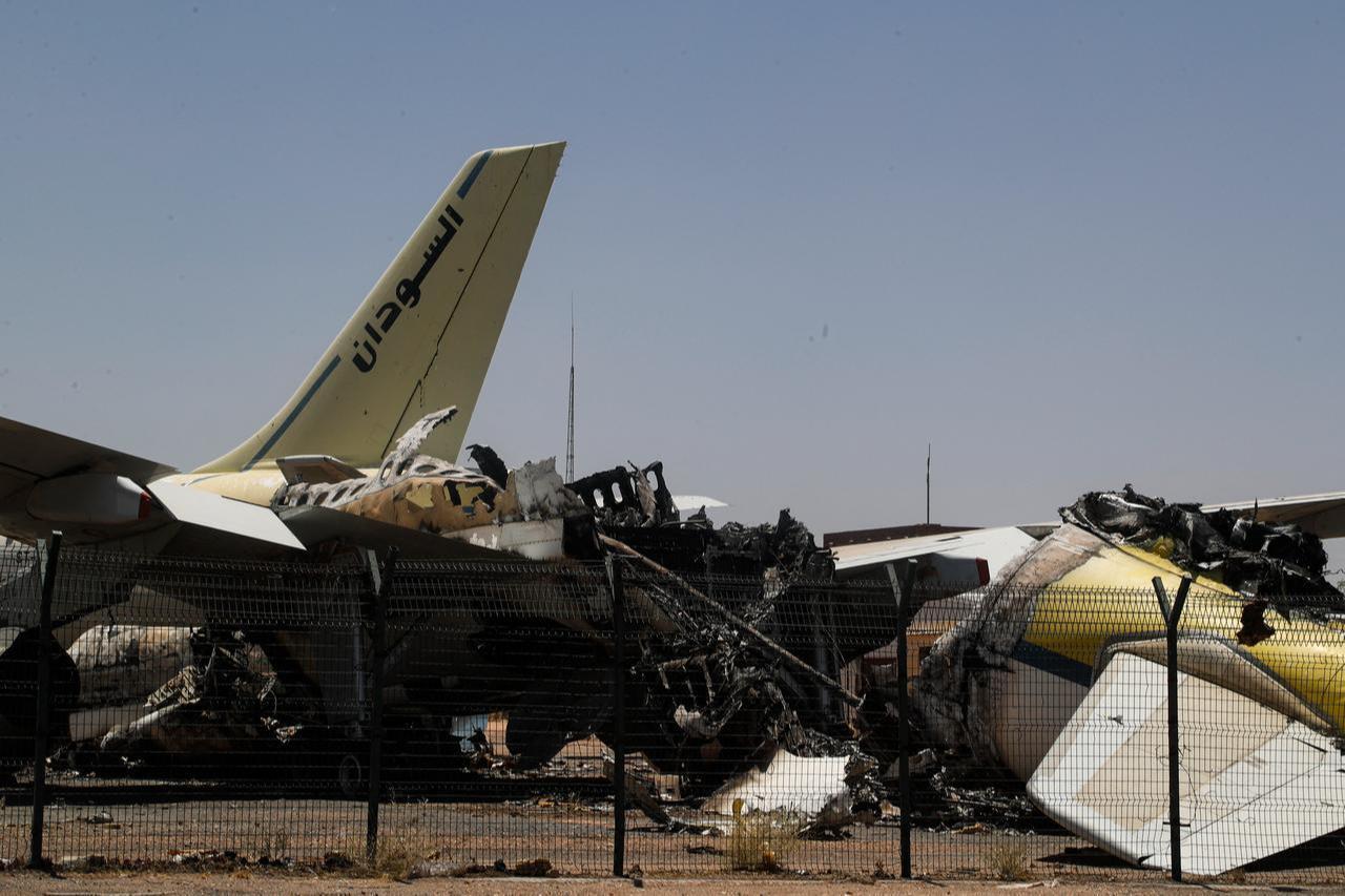 Heavily damaged aircraft are seen at Khartoum International Airport in Khartoum on April 28, 2026. (AFP Photo)