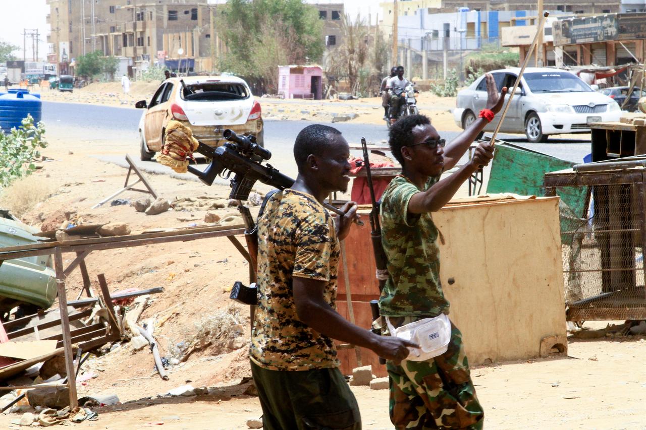 Sudanese army soldiers celebrate in Salha, south of Omdurman, two days after the Sudanese army recaptured it from the paramilitary Rapid Support Forces (RSF), May 22, 2025. (AFP Photo)