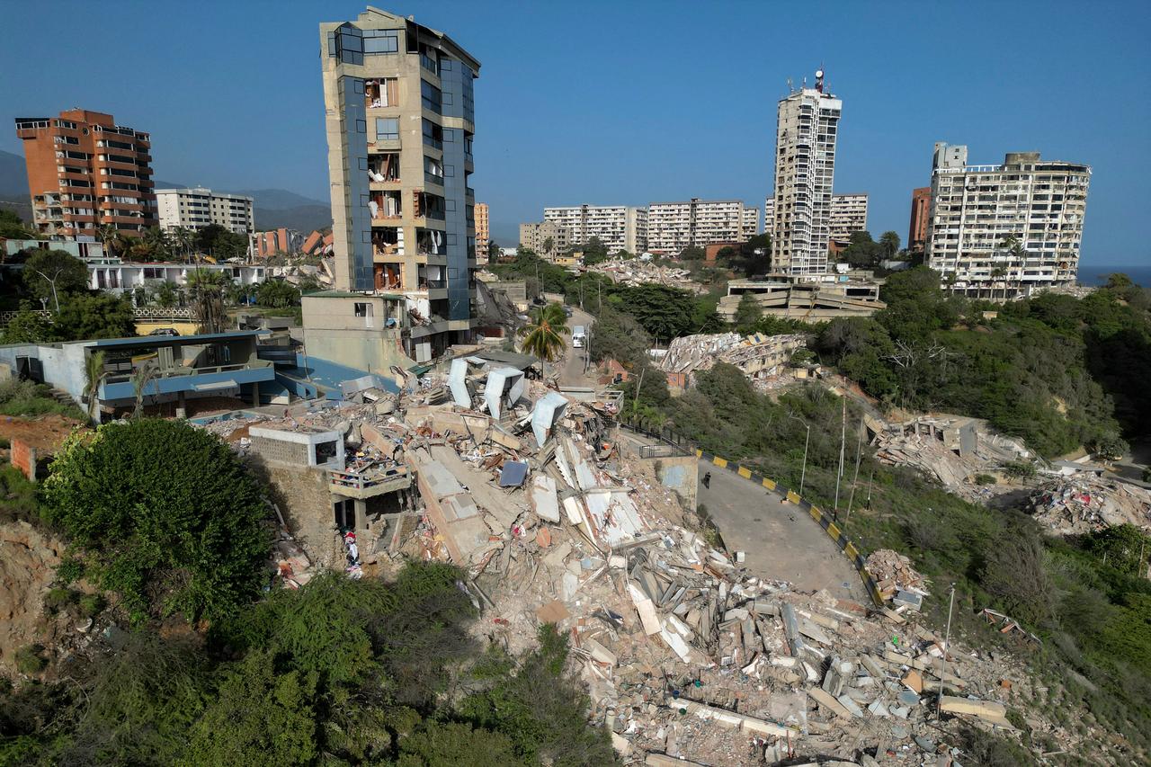 This aerial view shows collapsed buildings in Catia La Mar, La Guaira state, Venezuela, on June 27, 2026, following earthquakes that struck the region. (AFP Photo)