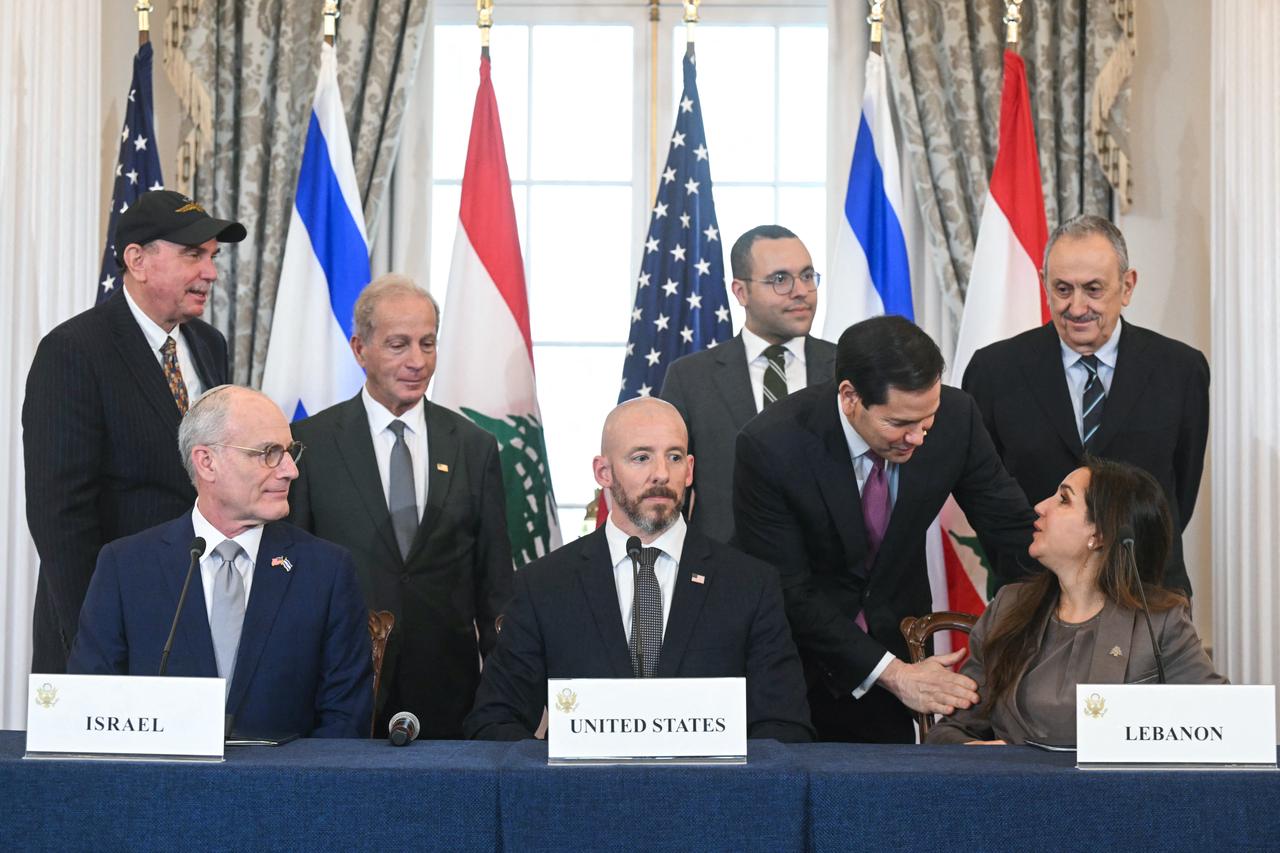 US Secretary of State Marco Rubio shakes hands with Lebanese Ambassador to the US Nada Hamadeh (R, front) as Israeli Ambassador to the US Yechiel Leiter (L, front) and State Department Chief of Staff Daniel Holler (C, front) look on during a signing ceremony at the US Department of State in Washington, DC, on June 26, 2026. (AFP Photo)