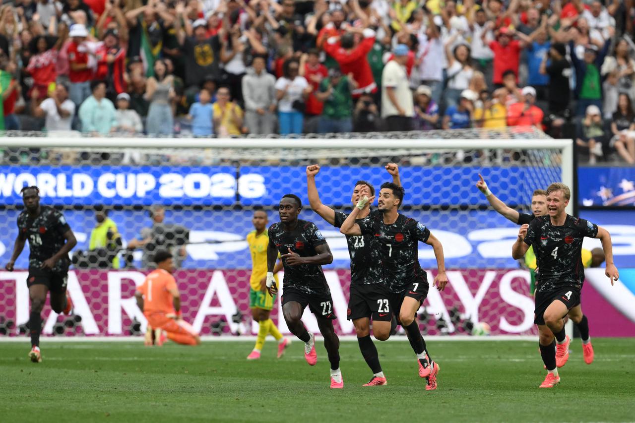Canada reaches World Cup last 16 after sinking South Africa