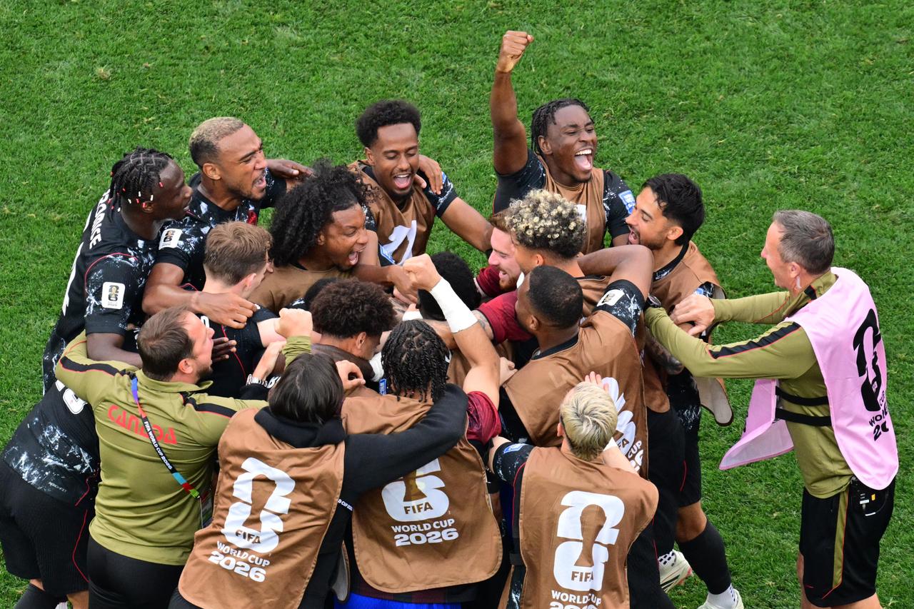 Canada's midfielder #07 Stephen Eustaquio celebrates scoring his team's first goal with teammates during the 2026 World Cup round of 32 football match between South Africa and Canada at the Los Angeles Stadium in InglewoodSouth Africa's players react after losing the 2026 World Cup round of 32 football match between South Africa and Canada at the Los Angeles Stadium in Inglewood, June 28, 2026. (AFP Photo)
