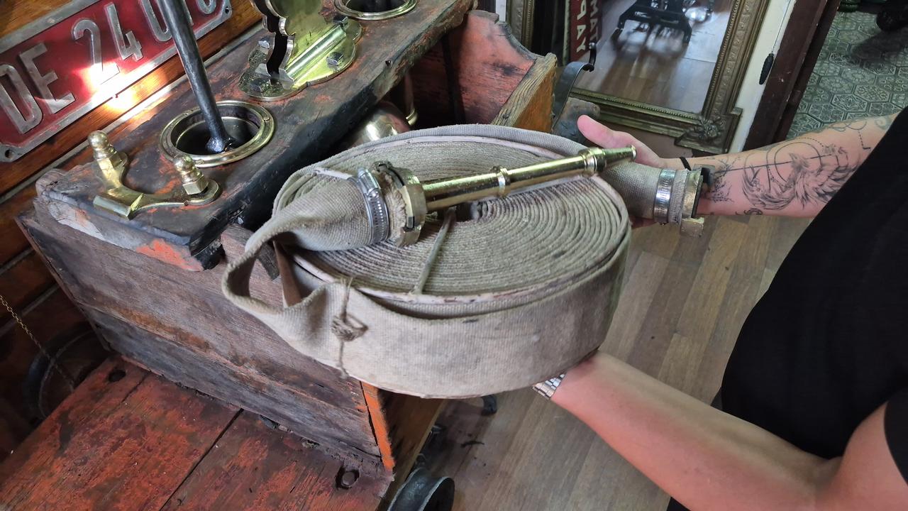 A hose belonging to the Ottoman-era firefighting tulumba is displayed beside the historic pump in Eskisehir, Türkiye. (IHA Photo)