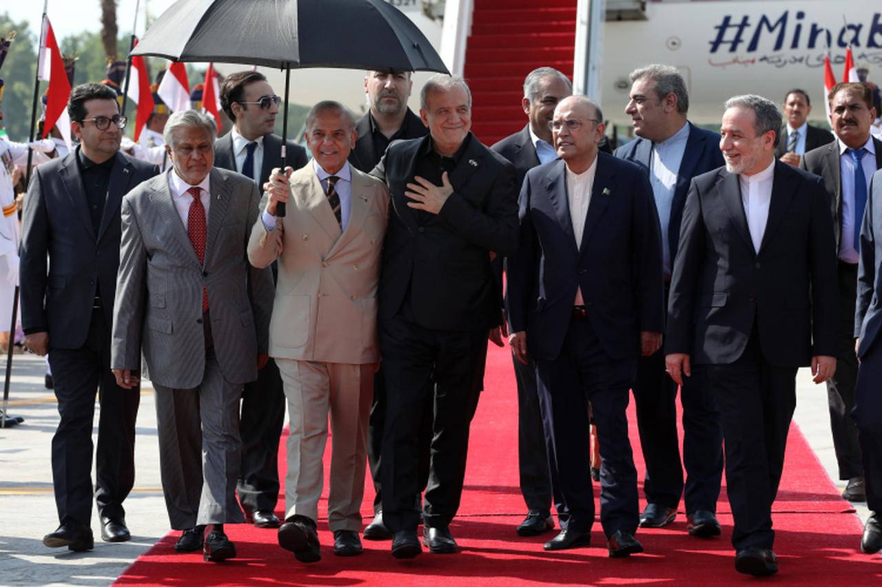 Iranian President Masoud Pezeshkian is welcomed by President of Pakistan, Asif Ali Zardari, and the Prime Minister, Shahbaz Sharif as Pezeshkian arrives Islamabad to attend ongoing US-Iran peace talks in Pakistan, on June 23, 2026. (Iranian Presidency/AA Photo)