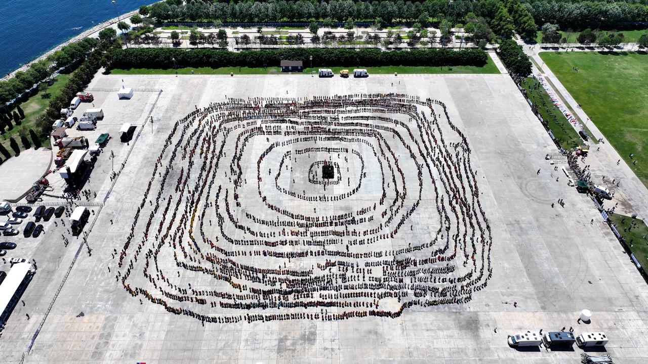 Thousands of costumed folk dancers perform horon during a Guinness World Records event at Maltepe Event Area in Istanbul, Türkiye, June 28, 2026. (AA Photo)