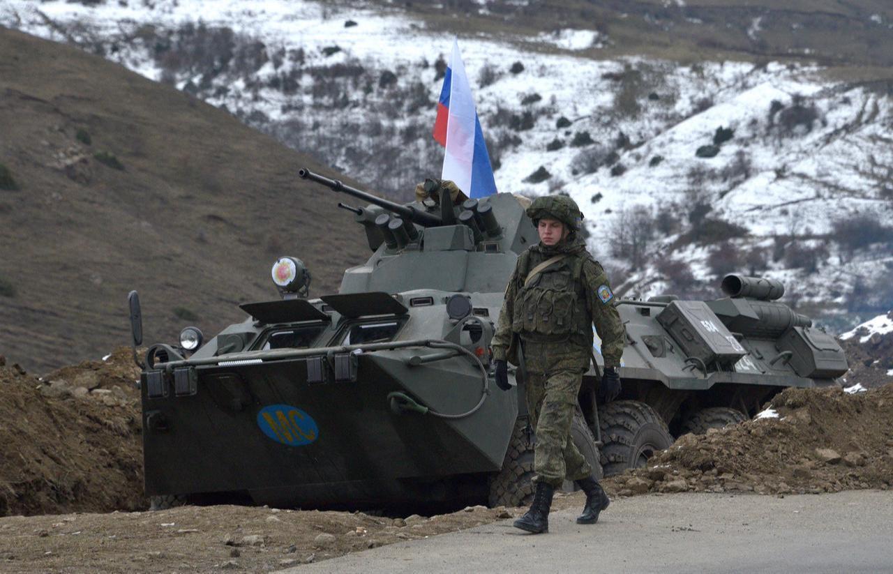Russian soldiers of the peacekeeping force man a checkpoint on a road outside the town of Stepanakert on November 26, 2020. (AFP Photo)
