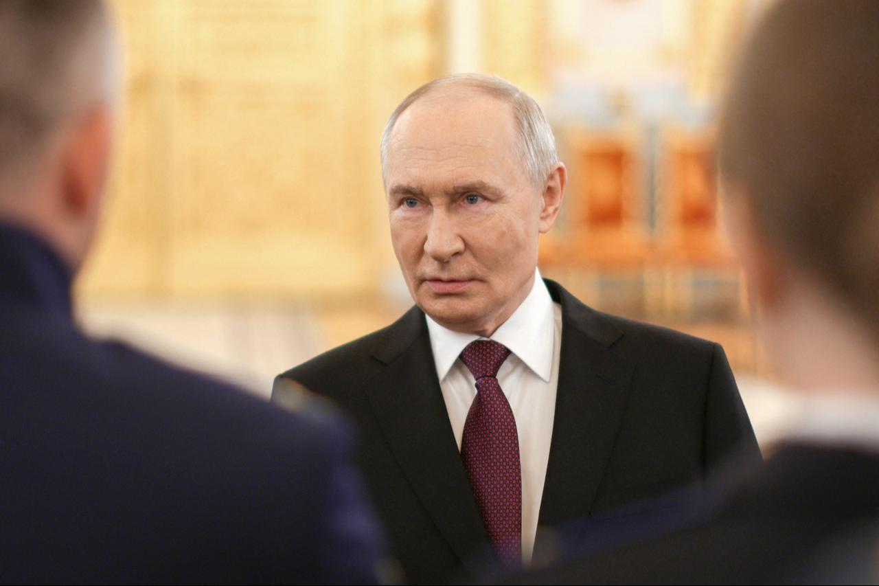 Russia's President Vladimir Putin talks to graduates of higher military educational institutions during a meeting at the Kremlin in Moscow, June 23, 2026. (AFP Photo)