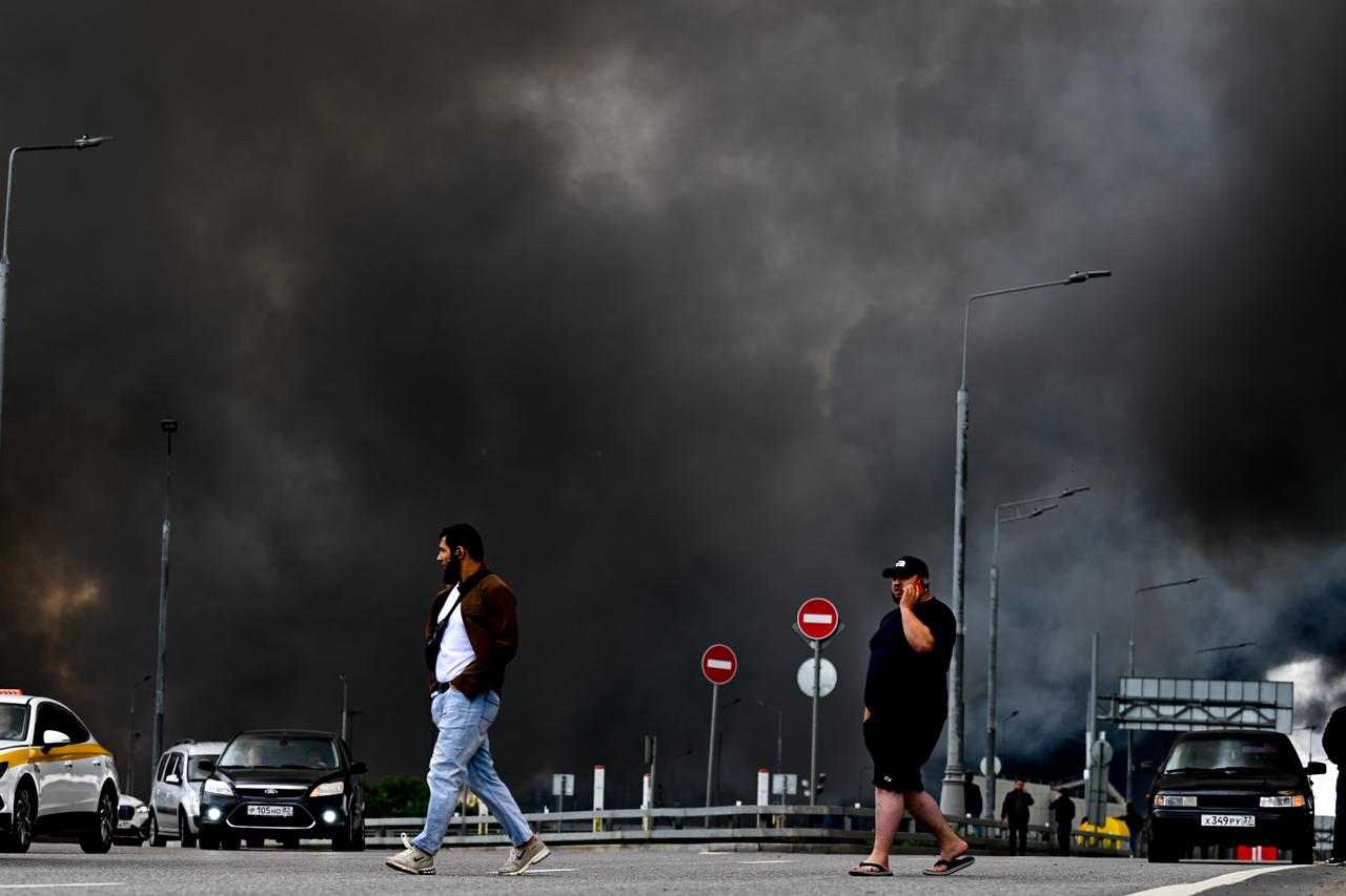 Black smoke rises from the refinery where a fire broke out following a strike as firefighting efforts continue in Moscow, Russia, June 18, 2026. (AA Photo)