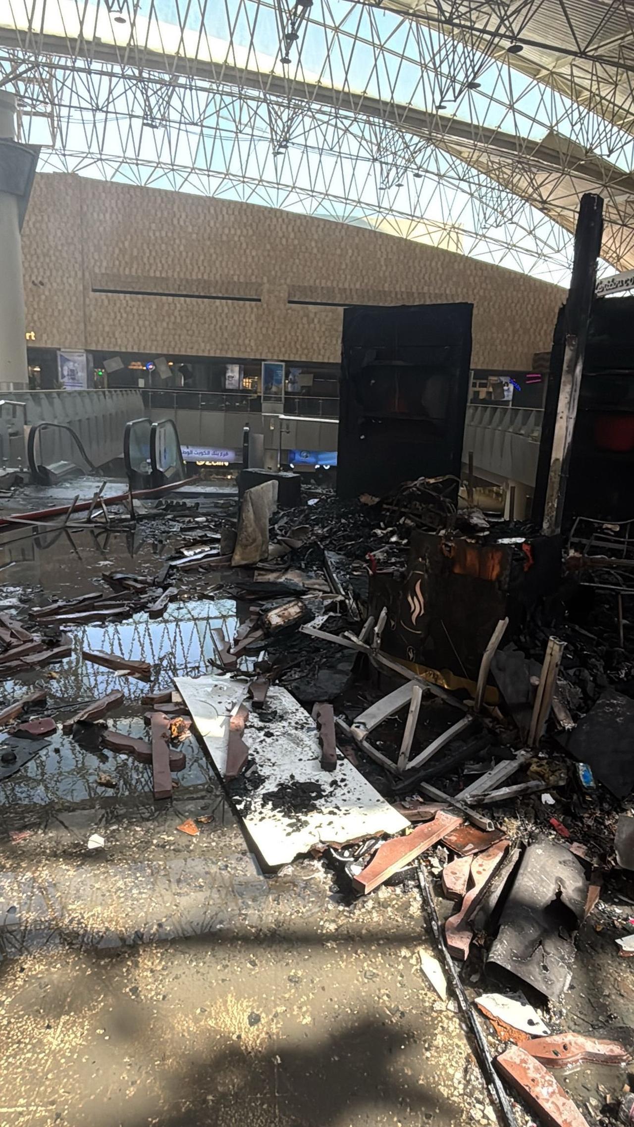 Damage is seen inside Kuwait International Airport's Terminal 1 after an Iranian drone and missile attack struck the facility, causing casualties and forcing the suspension of flight operations in Kuwait, June 3, 2026. (Photo via X / @@_A_khalifa)