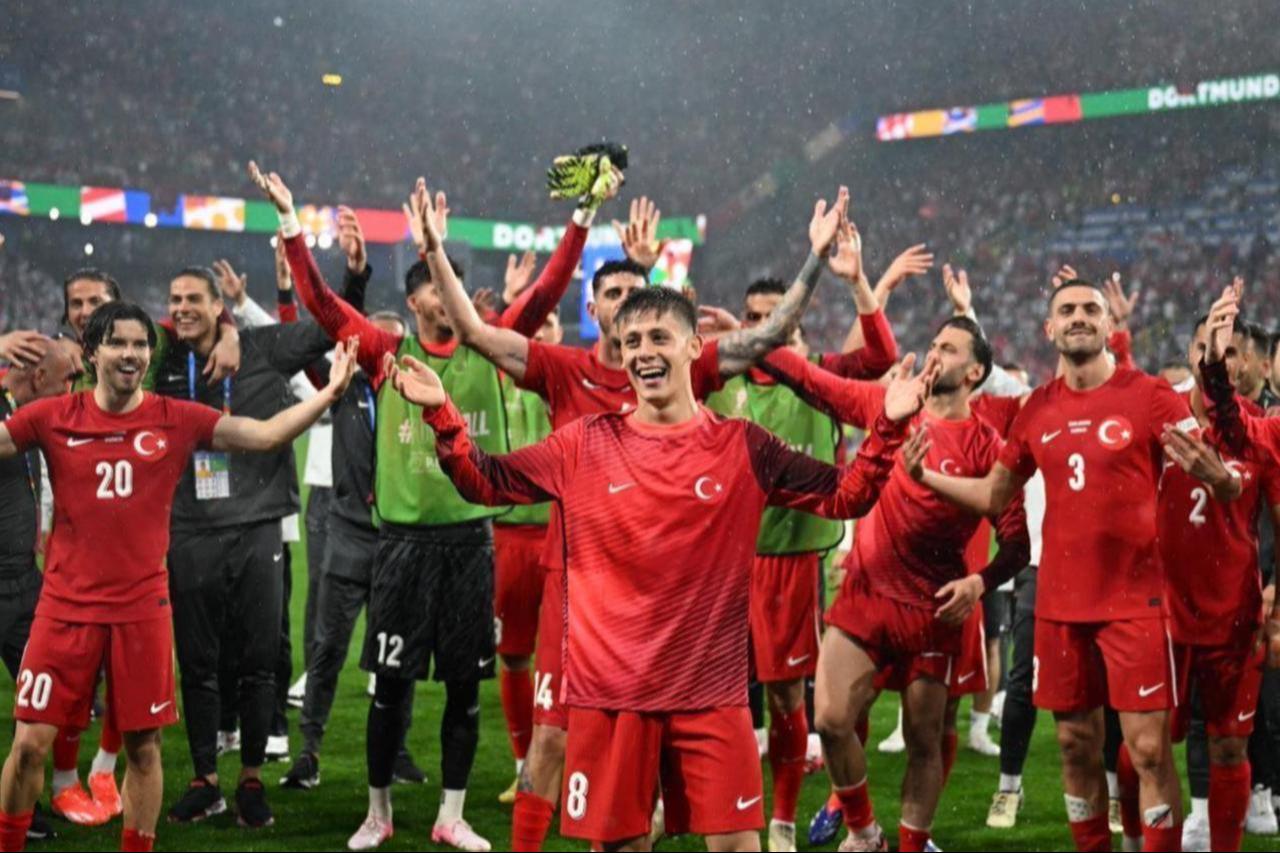 Turkish players celebrate after beating Georgia 3-1 in their EURO 2024 Group F opener in Dortmund, Germany, June 18, 2024. (AA Photo)