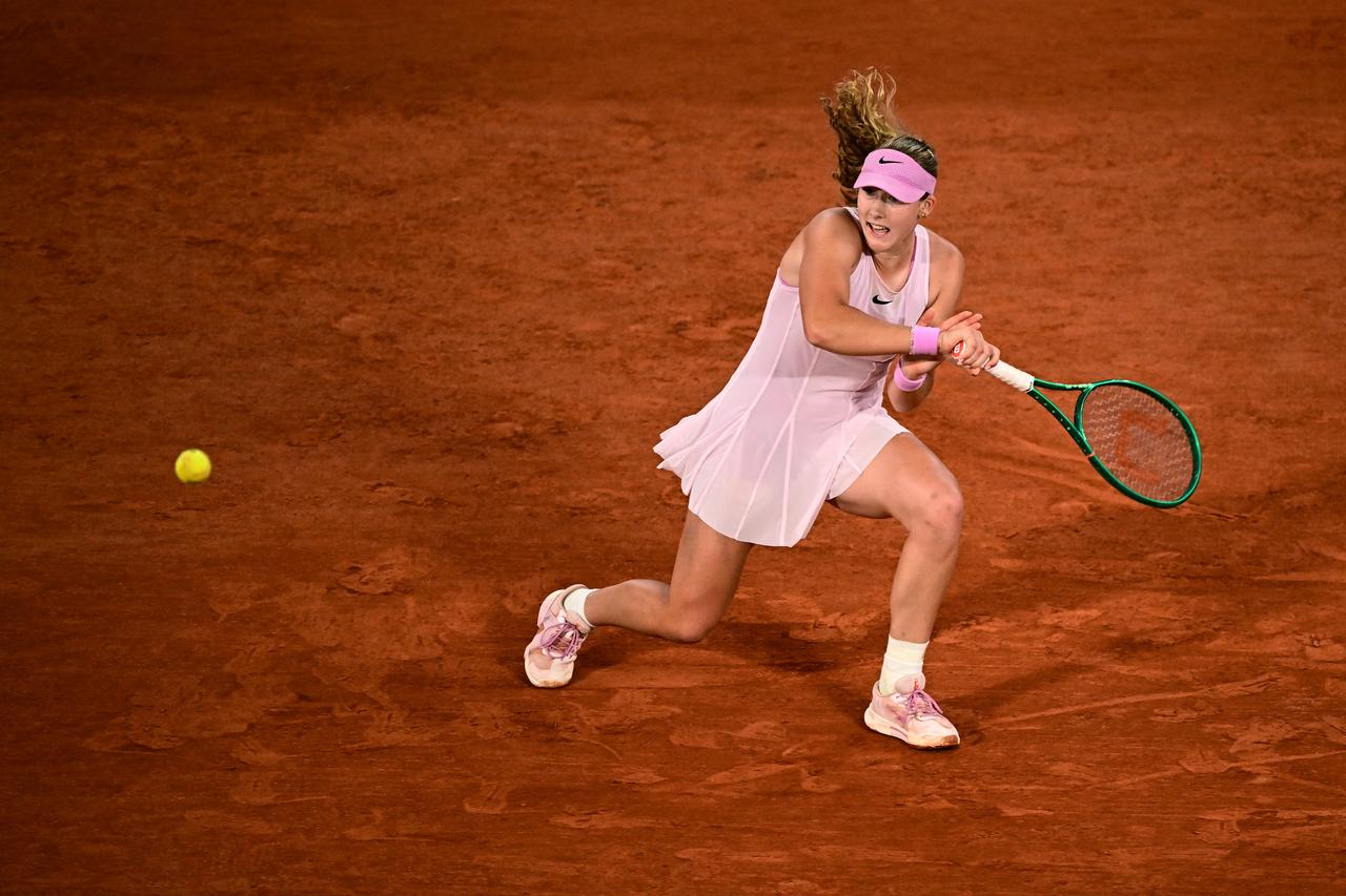 Mirra Andreeva plays a backhand return to Romania's Sorana Cirstea during their women's quarter final singles match on day 10 of the French Open tennis tournament on Court Philippe-Chatrier at the Roland-Garros Complex in Paris, June 2, 2026. (AFP Photo)