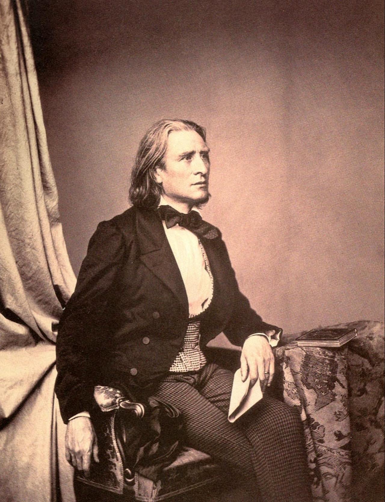 Composer and pianist Franz Liszt, photographed by Franz Hanfstaengl in 1858. (Photo via Wikimedia Commons/Public Domain)