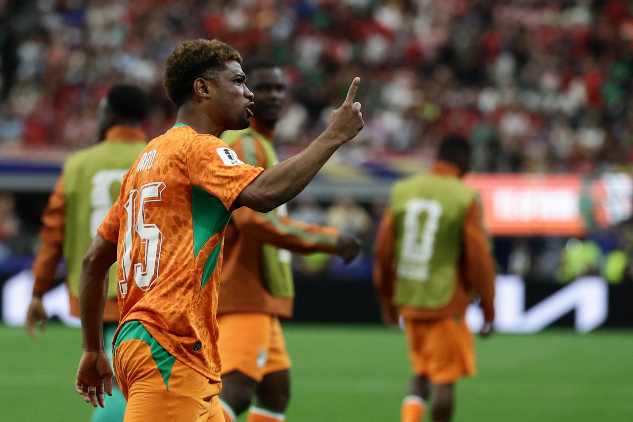 Ivory Coast's forward #15 Amad Diallo celebrate after scoring his team's first goal during the 2026 World Cup round of 32 football match between Ivory Coast and Norway at the Dallas Stadium in Arlington on June 30, 2026.  (AFP Photo)