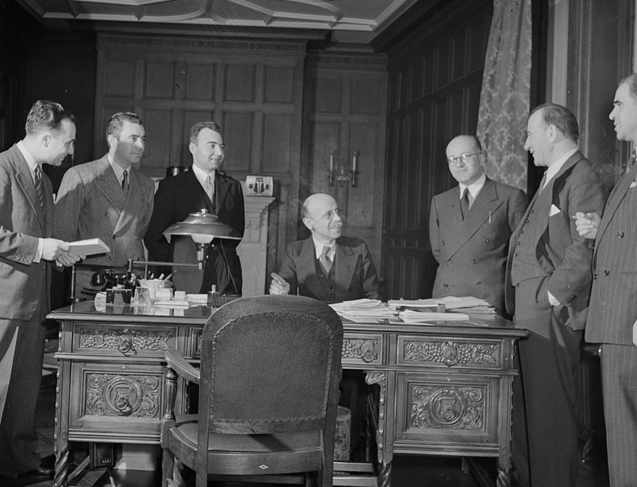 Turkish Ambassador Munir Ertegun is seen with staff inside the Turkish Embassy in Washington, D.C., U.S., 1942. (Photo by Marjory Collins / Library of Congress)
