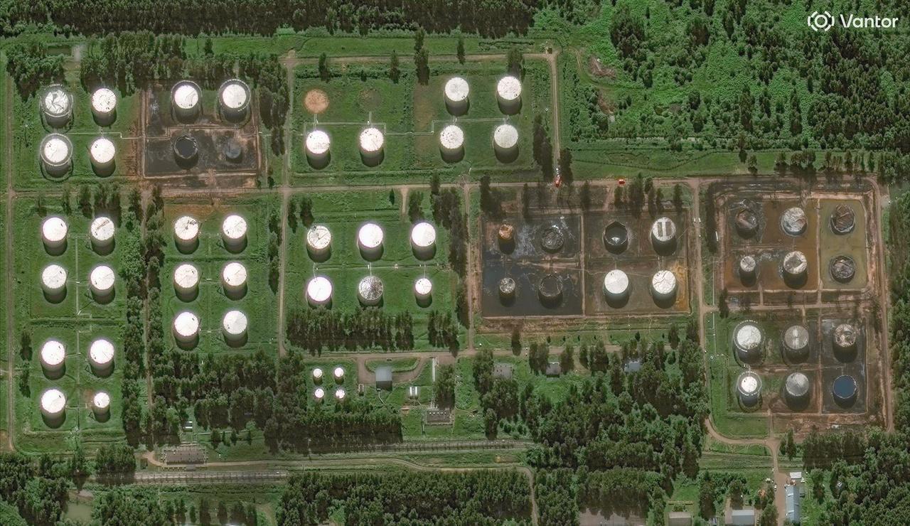 This handout satellite image, taken on June 21, 2026, shows damaged oil storage tanks in Rybinsk. (Photo by Handout/Satellite image ©2026 Vantor/AFP)