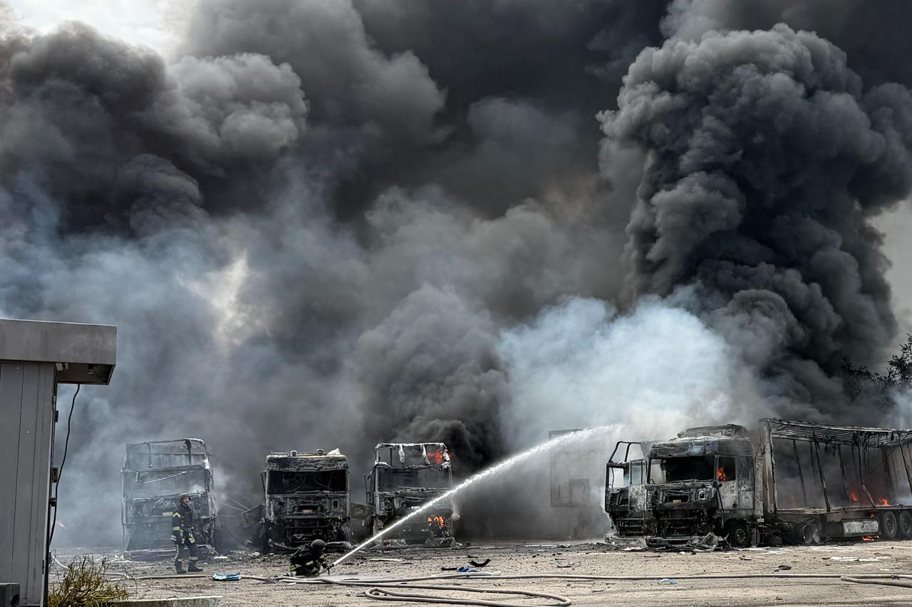Ukrainian rescuers work to extinguish a fire at the site of an air attack in Zaporizhzhia on June 25, 2026, amid the Russian invasion of Ukraine. (AFP Photo)