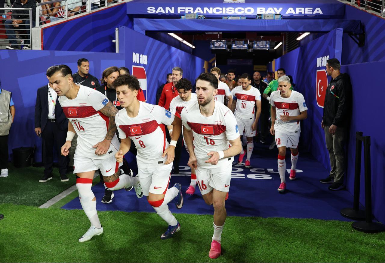 Abdulkerim Bardakci #14, Arda Guler #8 and Ismail Yuksek #16 of Turkiye run out of the tunnel with teammates during the FIFA World Cup 2026 Group D match between Türkiye and Paraguay at San Francisco Bay Area Stadium on June 19, 2026 in Santa Clara, California. (AFP Photo)