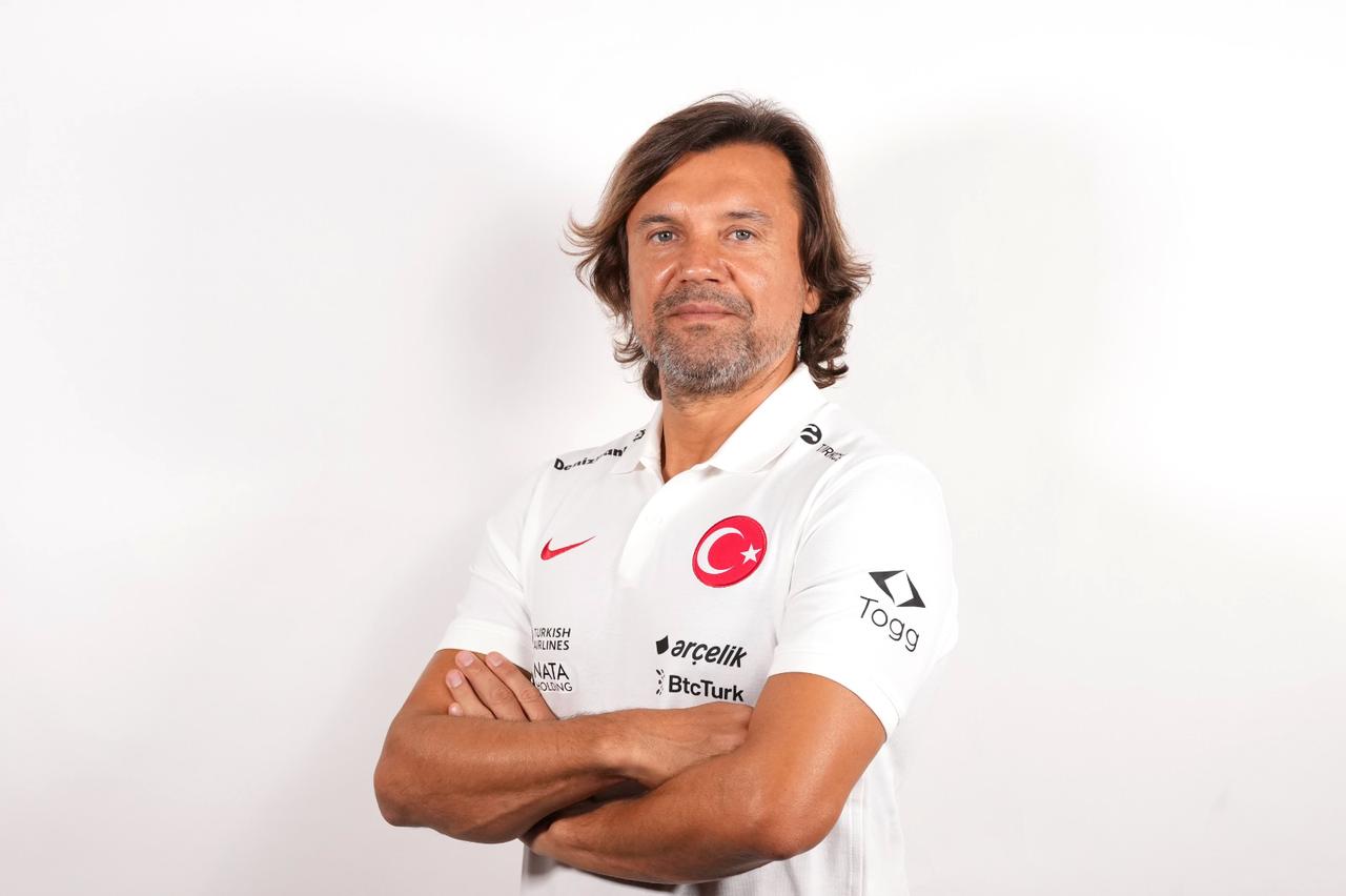 Serkan Damla poses in a Türkiye national team shirt. (Photo via Turkish Football Federation)