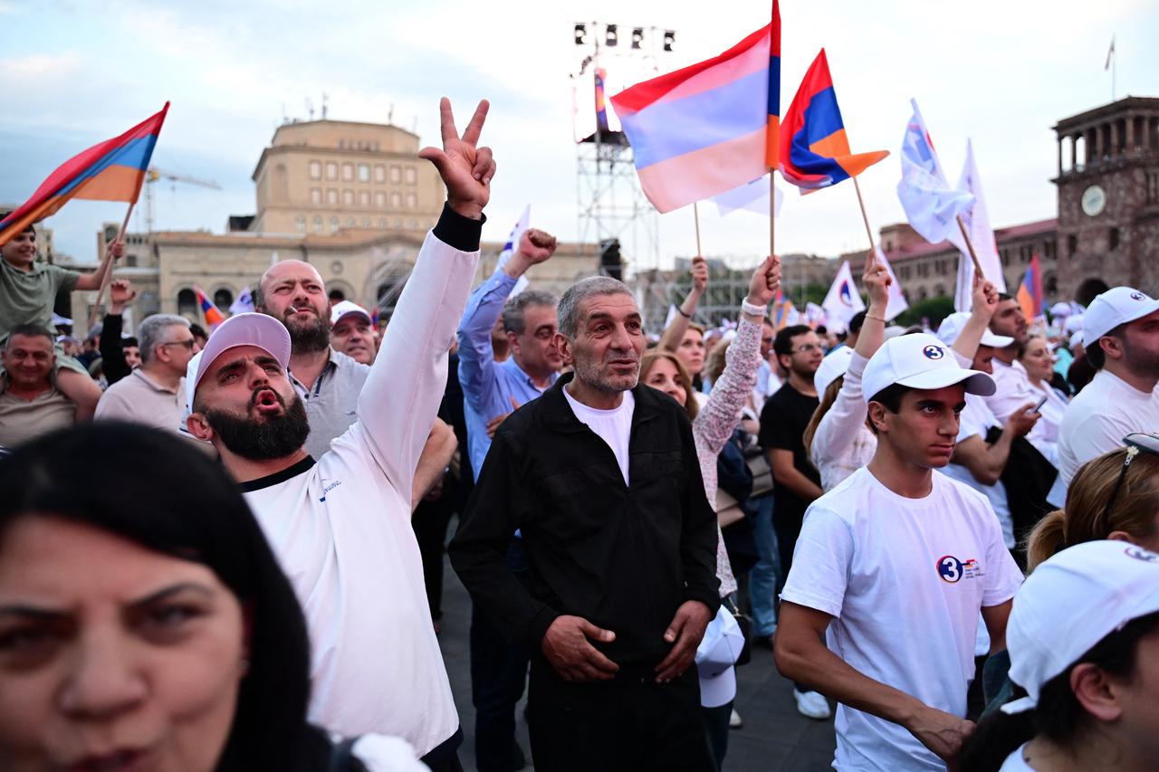Supporters of Strong Armenia, the party of billionaire Russian-Armenian businessman Samvel Karapetyan - who is under house arrest on charges of plotting a coup, stage a campaign rally in central Yerevan on June 3, 2026. (AFP Photo)