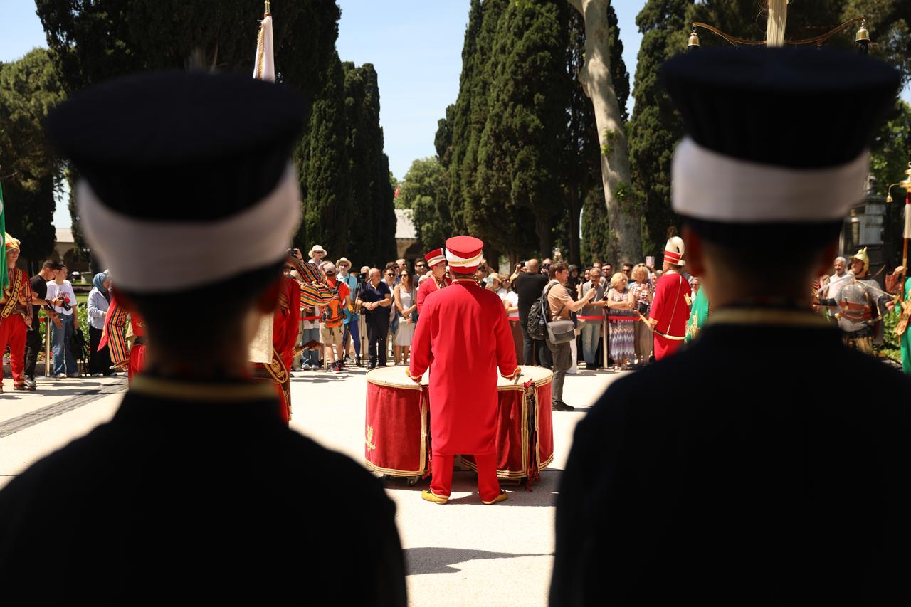 Members of the mehter band carry ceremonial standards during a traditional Ottoman military music performance at Topkapi Palace in Istanbul, Türkiye. (AA Photo)