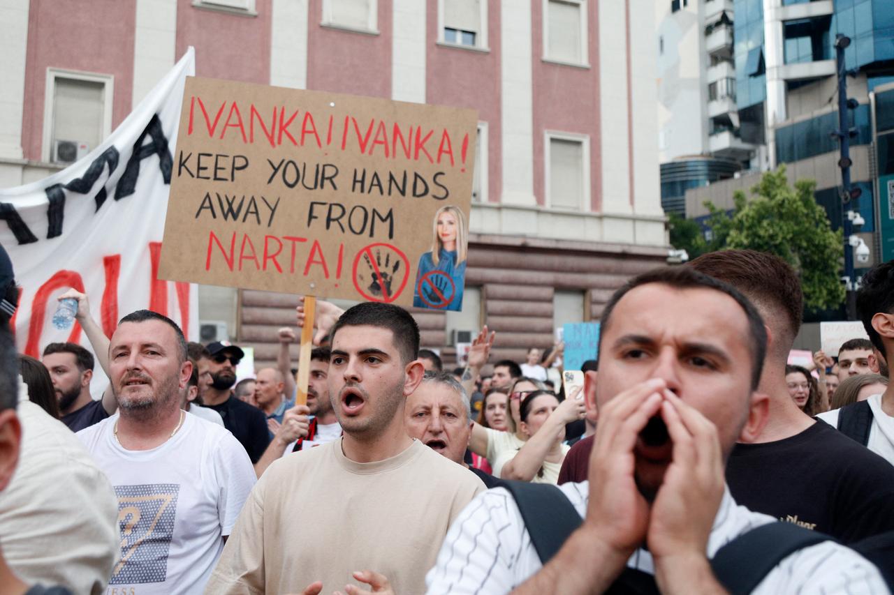 Protestors take part in a demonstration in front of the prime minister's office, against the construction of a luxury resort near a protected natural area, in Tirana on June 3, 2026. (AFP Photo)