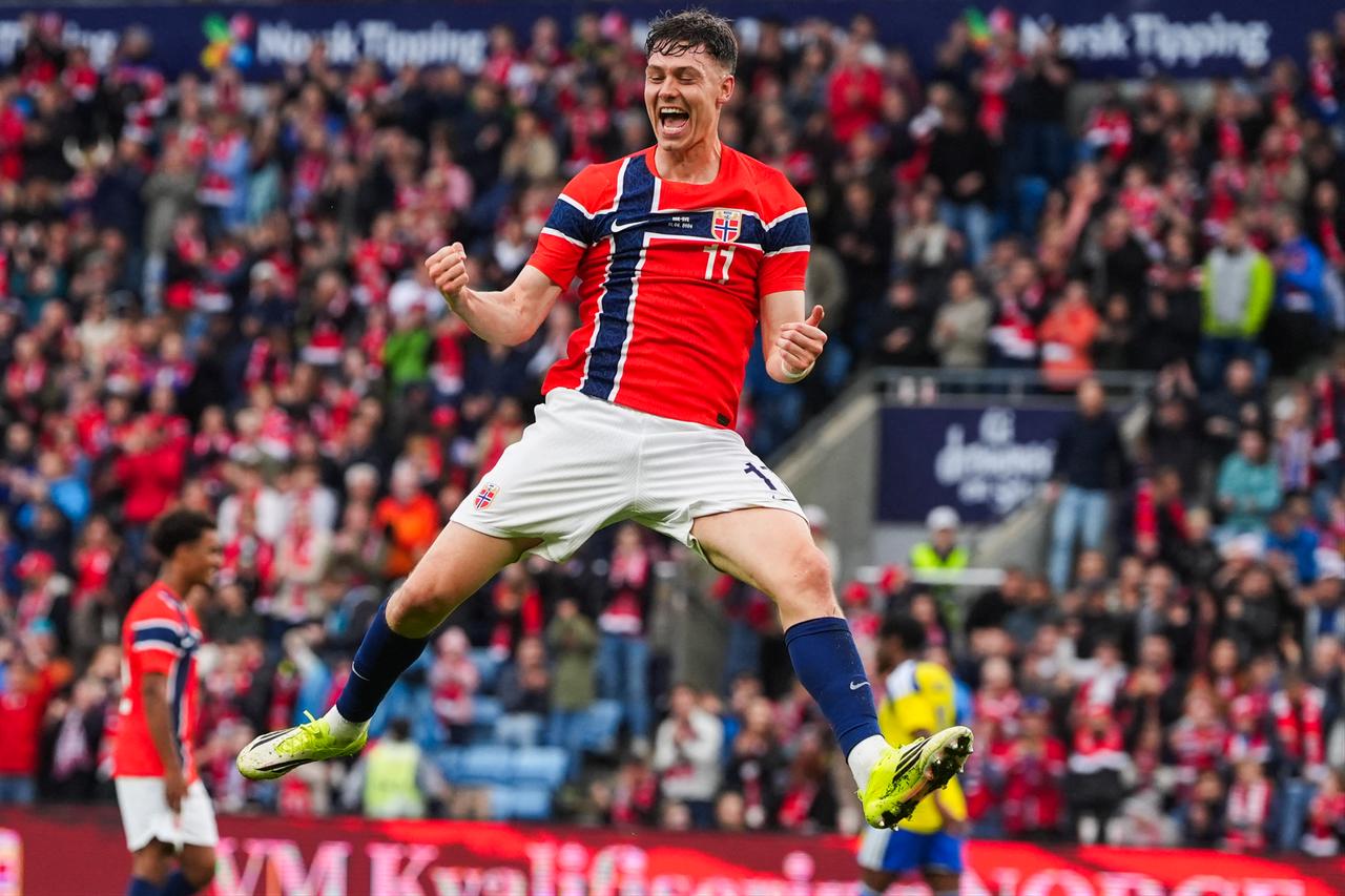 Norway's forward #11 Jorgen Strand Larsen celebrates scoring the 3-0 goal with his teammates during the friendly match between Norway and Sweden at Ullevaal Stadium, June 1, 2026 ahead of the 2026 FIFA World Cup football tournament. (AFP Photo)