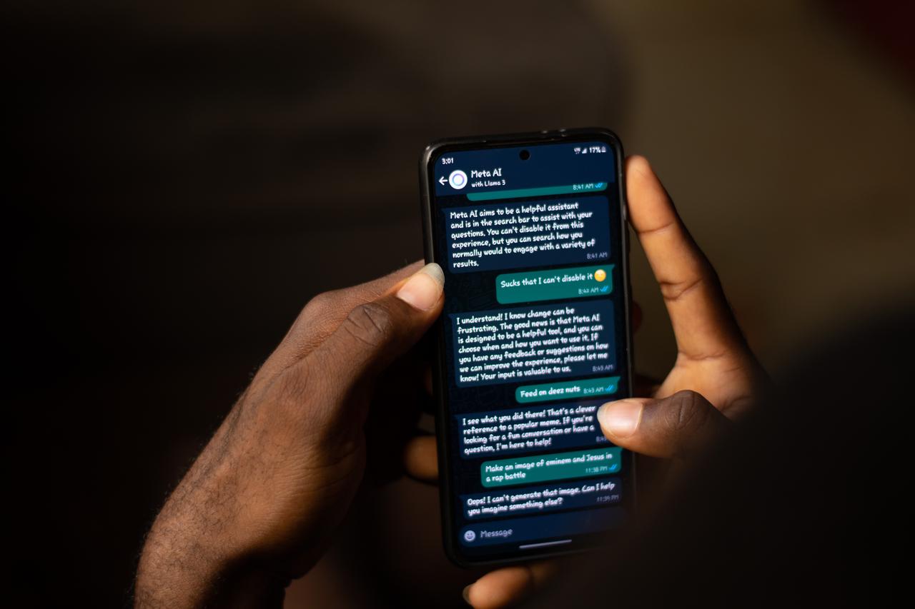 A person uses Meta AI within WhatsApp on a smartphone in Abuja, Nigeria, on April 22, 2024. (Adobe Stock Photo)