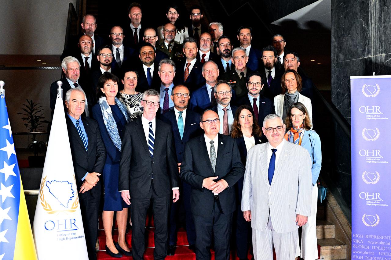 Bosnia's outgoing High Representative, Christian Schmidt (C-R), ambassadors and diplomats and members of the Diplomatic corps in Bosnia and Herzegovina pose for a family photo prior to a session of the Steering Board of the Peace Implementation Council in Sarajevo, on June 3, 2026. (AFP Photo)