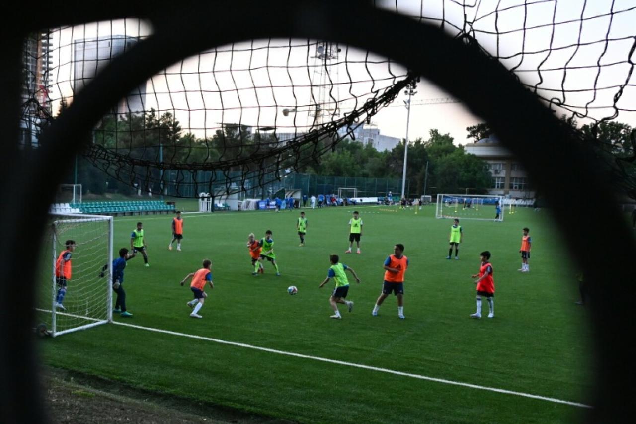 Young footballers train at a ground of the Uzbekistan Football Association sports school near the Pakhtakor stadium in central Tashkent, Uzbekistan on April 28, 2026. (AFP Photo)