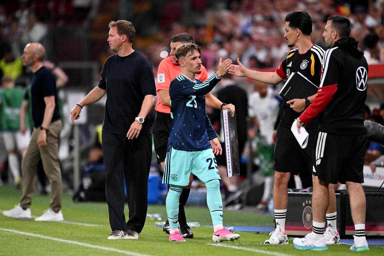 Germany's midfielder #25 Lennart Karl (C) leaves the pitch during a friendly match between Germany and Finland ahead of the 2026 FIFA World Cup football tournament, in Mainz, western Germany, May 31, 2026. (AFP Photo)