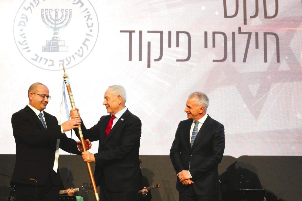 The photo shows the Mossad director Roman Gofman (L), Israeli Prime Minister Benjamin Netanyahu (C), and former Mossad director David Barnea during a handover ceremony in Israel, June 2, 2026. (Photo via Telegram)