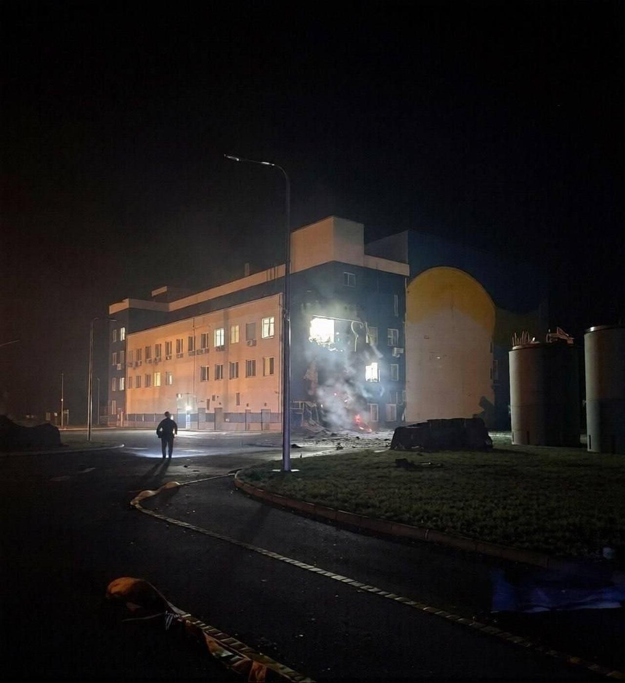 A damaged building smolders following a reported Russian drone strike near the spent nuclear fuel storage facility at the Chornobyl nuclear power plant in Ukraine, June 7, 2026. (Photo via Telegram)
