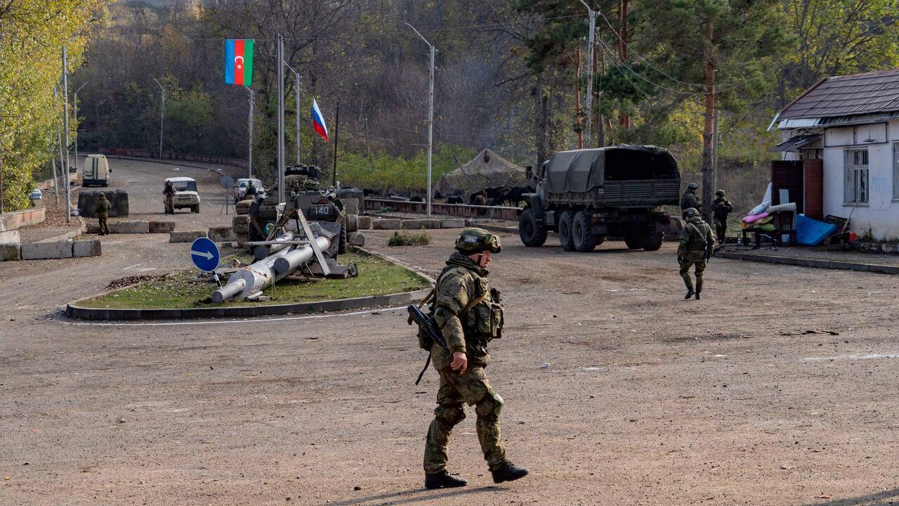 Russian peacekeepers patrol at a checkpoint near Shusha along the Goris-Stepanakert road on November 17, 2020. (AFP Photo)