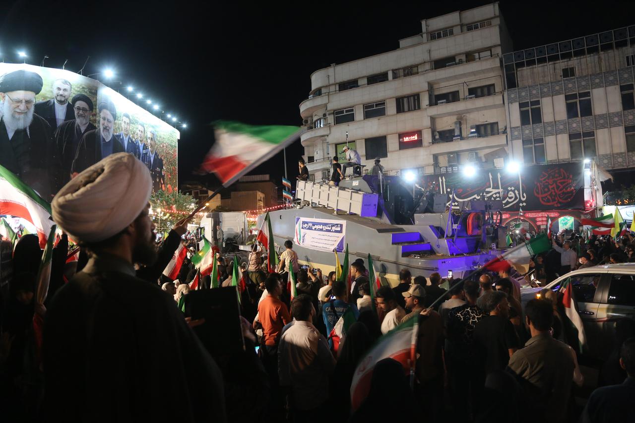Thousands of people gather at Revolution Square to protest against the attacks launched by the US and Israel on Iran, in Tehran, Iran, May 30, 2026. (AA Photo)