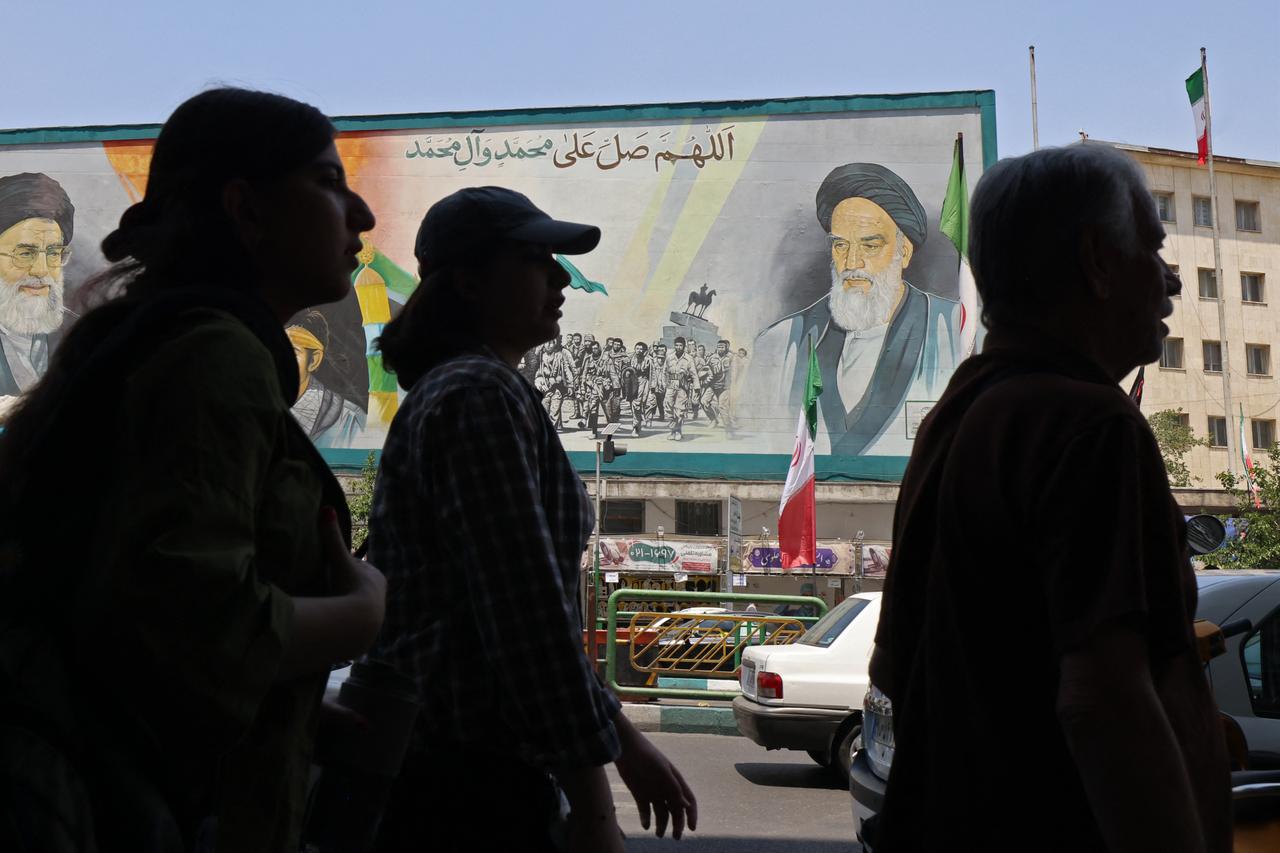 Iranian women walk through the Enghelab Square in Tehran on June 3, 2026. (AFP Photo)