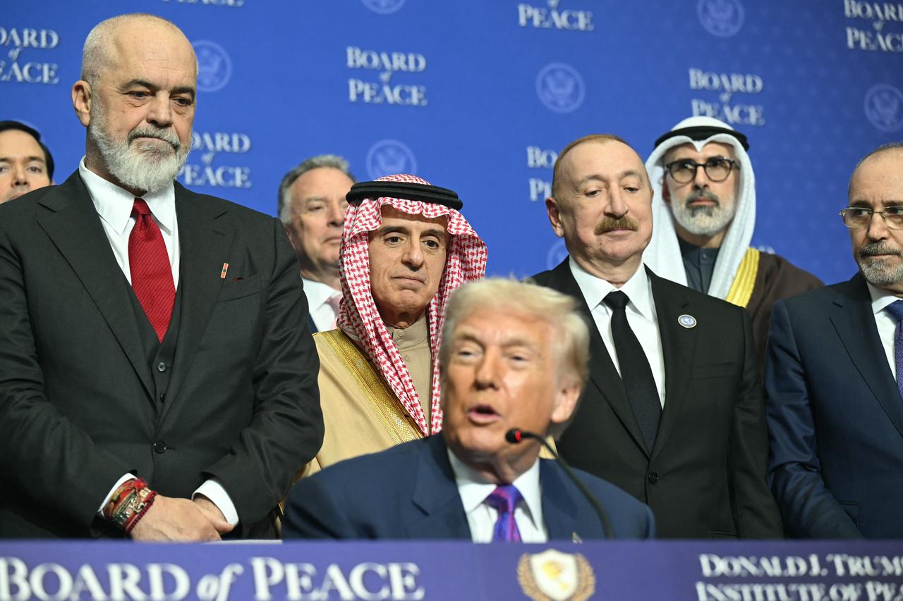 (L/R) Albania's Prime Minister Edi Rama, Saudi Arabia's Minister of State for Foreign Affairs Adel al-Jubeir, and Azerbaijan's President Ilham Aliyev look on as US President Donald Trump speaks during a signing ceremony at the inaugural meeting of the "Board of Peace" at the US Institute of Peace in Washington, DC, on February 19, 2026. (AFP Photo)