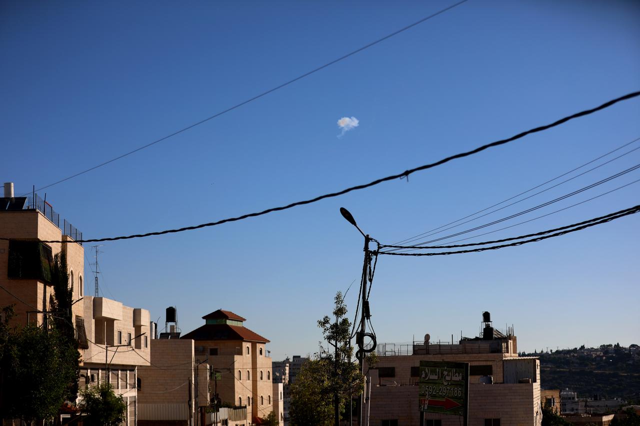 Smoke lingers in the sky over the Palestine's West Bank city of Hebron following an attempted interception of Iranian missiles on June 8, 2026. (AA Photo)