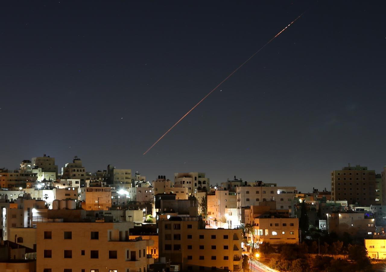 Missiles launched from Iran toward Israel are seen in the sky over the West Bank city of Hebron on June 7, 2026. (AA Photo)