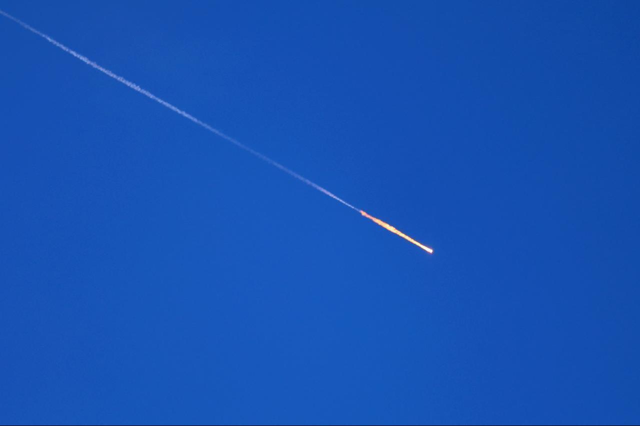 A missile leaves a fiery trail across the sky over the Palestine's West Bank city of Hebron on June 8, 2026, amid missile launches from Iran toward Israel. (AA Photo)