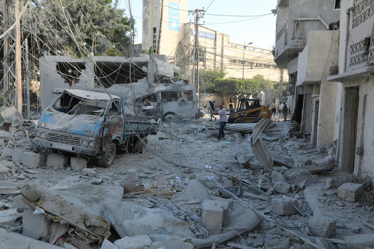 Workers clean the debris following Israeli airstrikes that hit the previous day, near the archaeological site of the Roman hippodrome in the southern Lebanese city of Tyre, June 8, 2026. (AFP Photo)