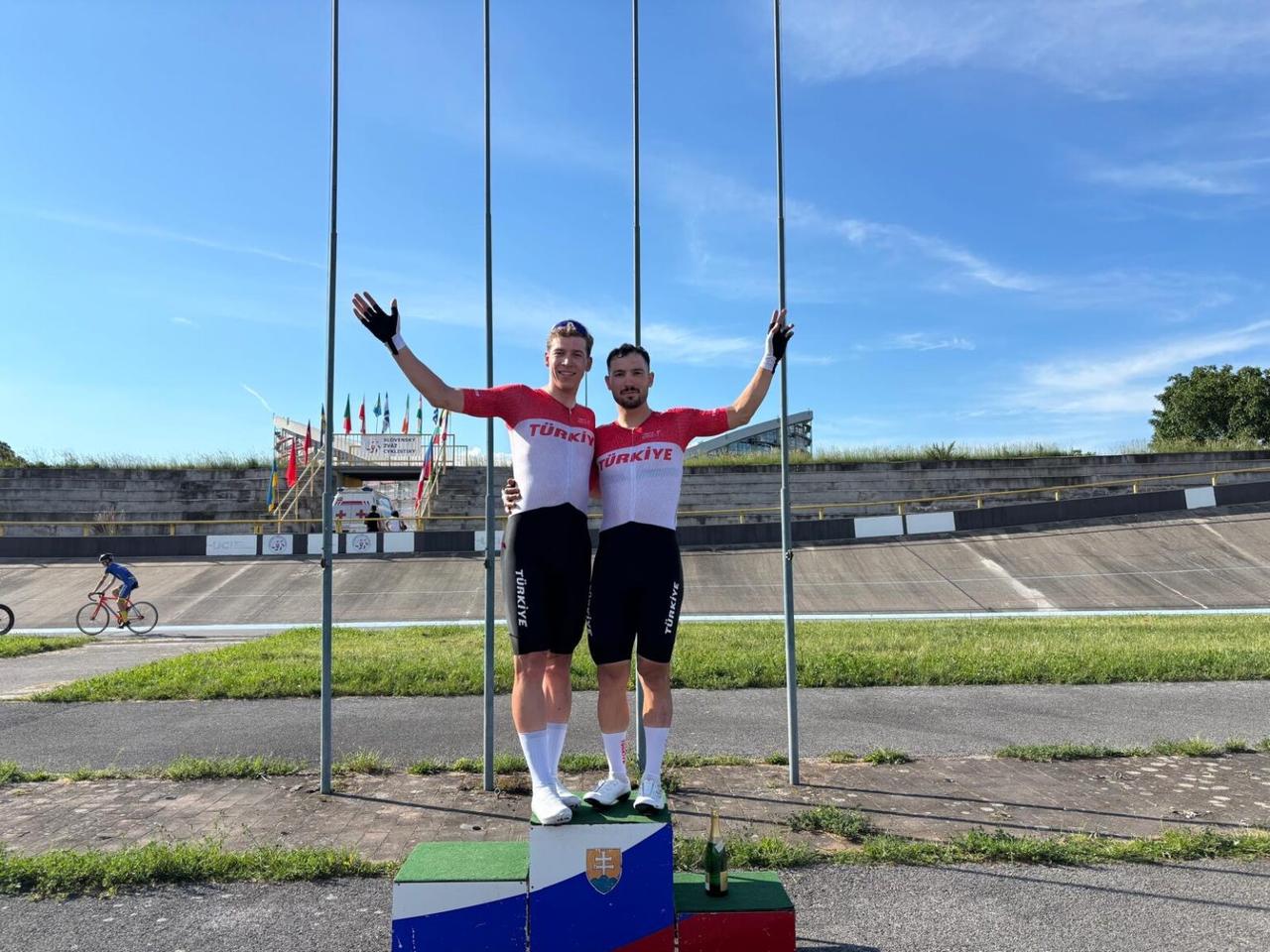 Mustafa Tarakci and Ramazan Yilmaz celebrate at the velodrome after Türkiye’s medal-winning performance at the UCI Class 1 Grand Prix Presov in Slovakia. (Photo via Turkish Cycling Federation)