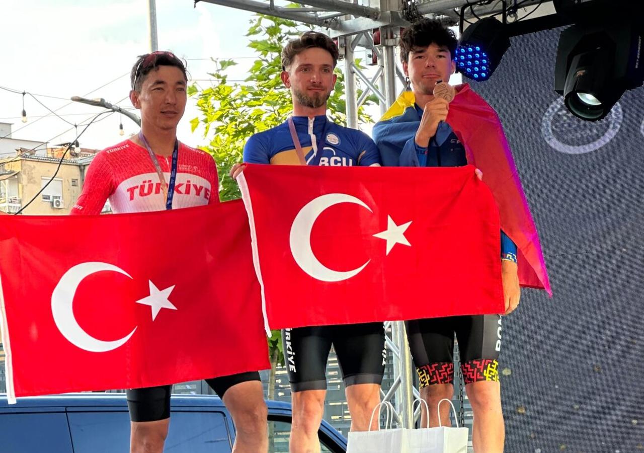 Ahmet Orken and Burak Abay appear on the podium after Türkiye secured medals in the elite men’s category at the 2026 Road Balkan Championships. (Photo via Turkish Cycling Federation)