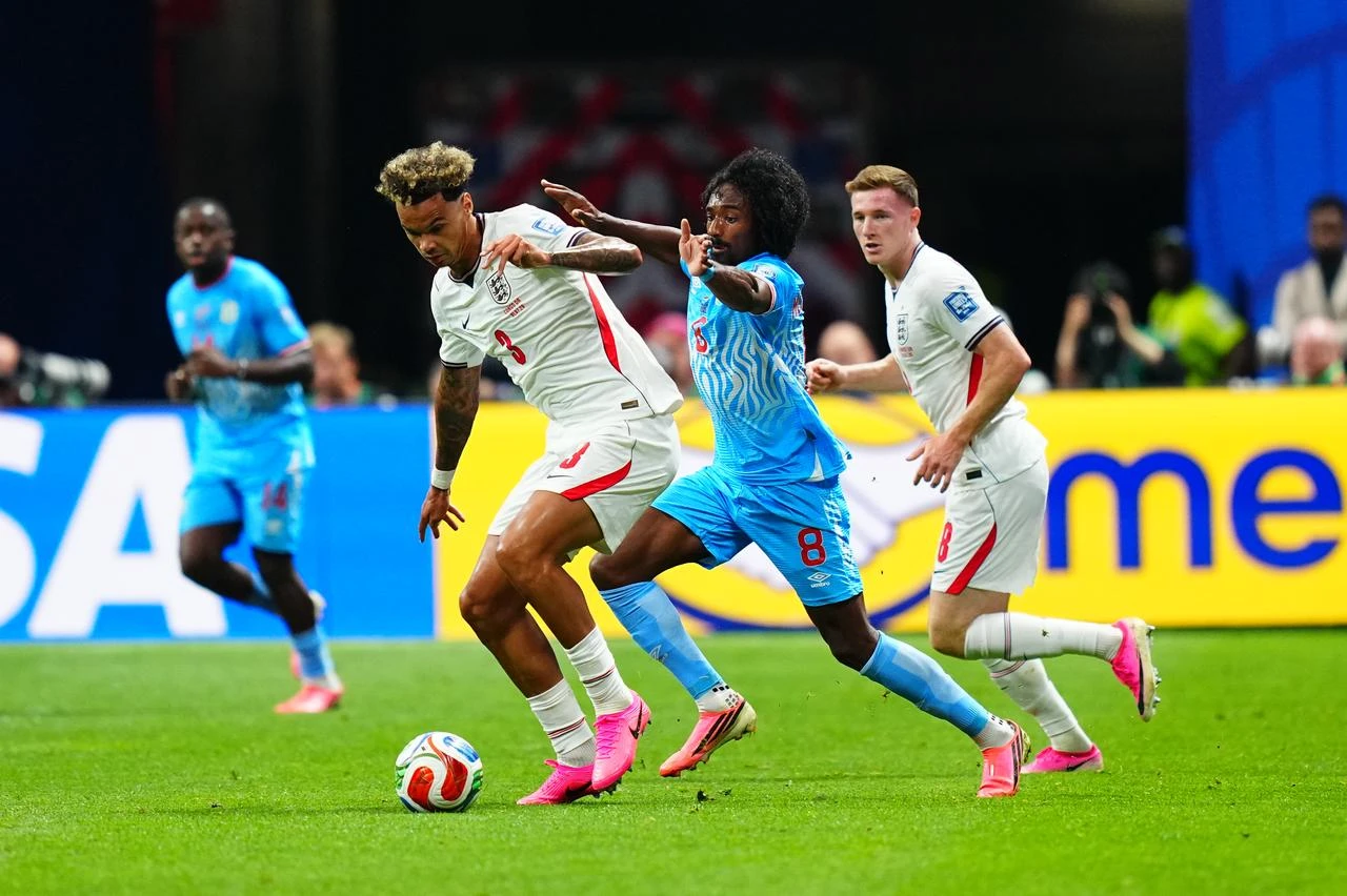 Nico O’Reilly (3) of England in action against Samuel Moutoussamy (8) of DR Congo during 2026 FIFA World Cup Round of 32 match between England and DR Congo at Mercedes-Benz Stadium (Atlanta Stadium) in Atlanta, Georgia, United States on July 1, 2026. (AA Photo)