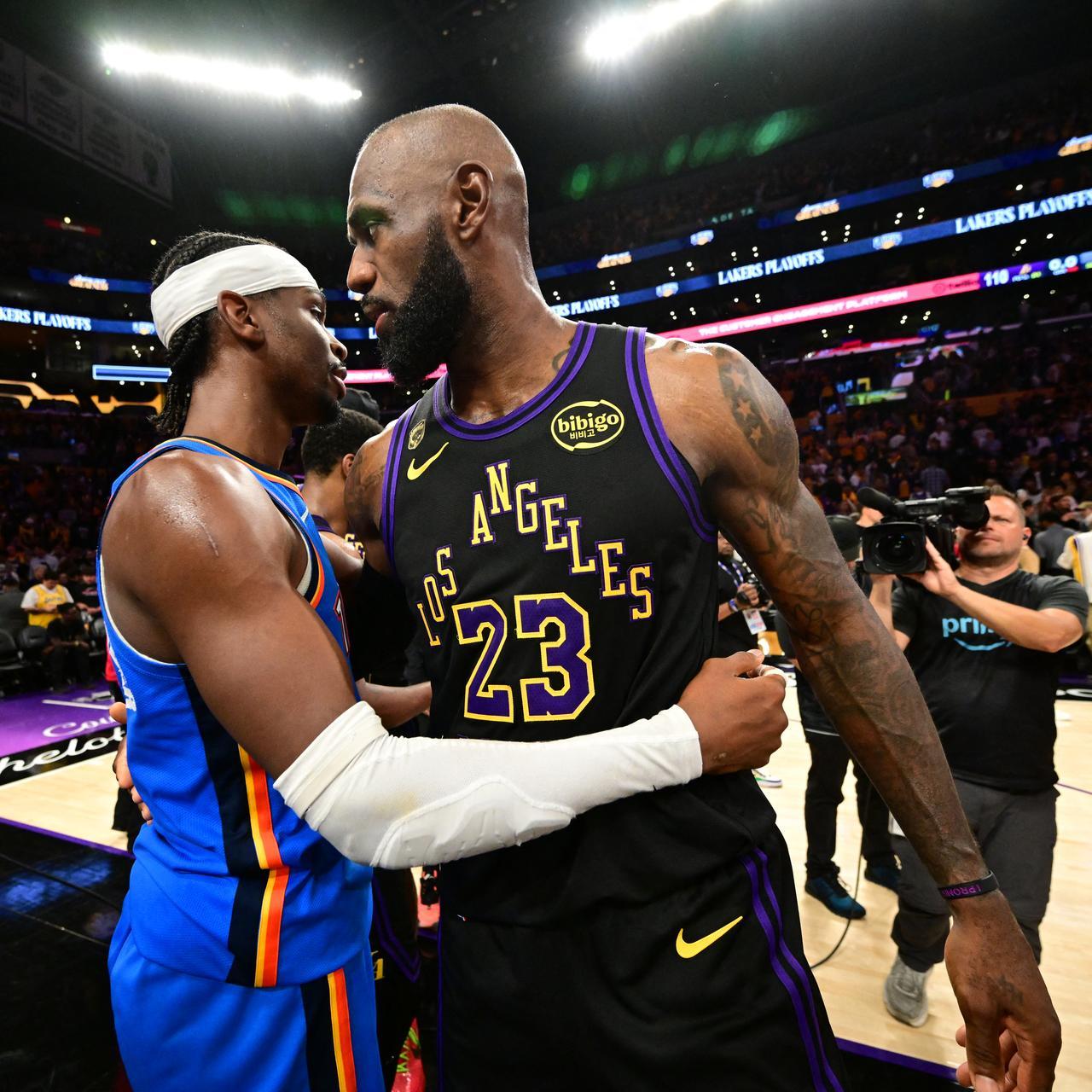 LeBron James #23 of the Los Angeles Lakers and Shai Gilgeous-Alexander #2 of the Oklahoma City Thunder hug after the game during Round Two Game Four of the 2026 NBA Playoffs at Crypto.Com Arena in Los Angeles, California, May 11, 2026. (AFP Photo)