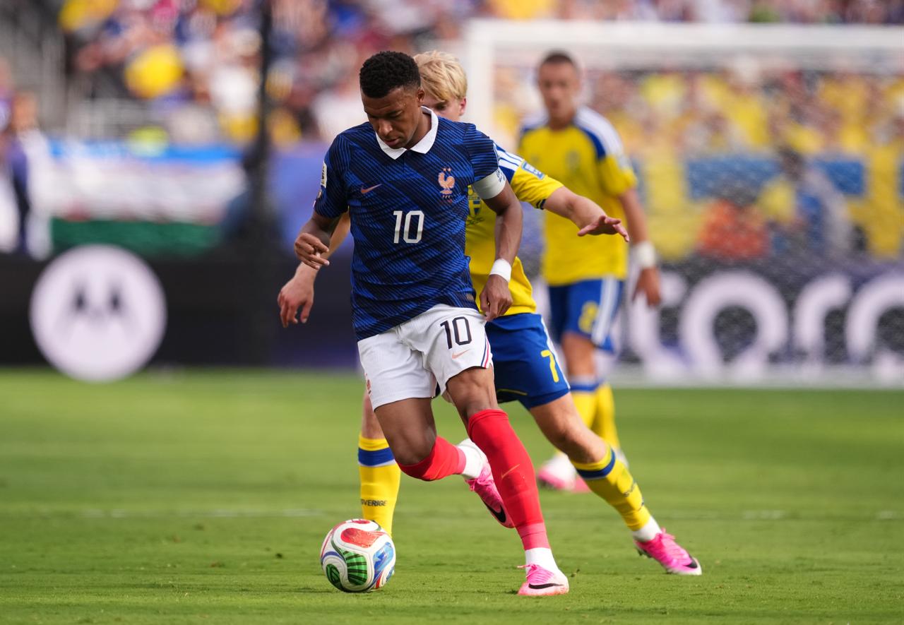 Kylian Mbappe (10) of France and Lucas Bergvall (7) of Sweden compete for the ball during the 2026 FIFA World Cup Round of 32 match between France and Sweden at New Jersey Stadium (MetLife Stadium) in East Rutherford, New Jersey, USA, June 30, 2026. (AA Photo)
