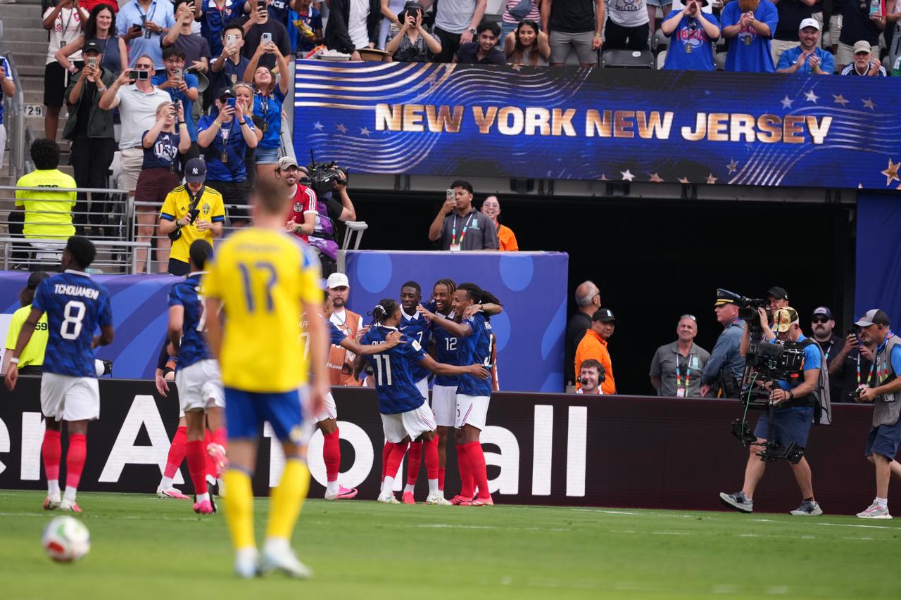Bradley Barcola (12) of France celebrates with teammates after scoring a goal during the 2026 FIFA World Cup Round of 32 match between France and Sweden at New Jersey Stadium (MetLife Stadium) in East Rutherford, New Jersey, USA, June 30, 2026. (AA Photo)