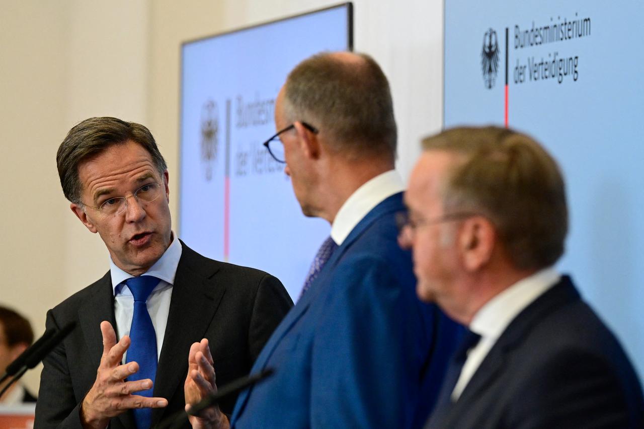 (L-R) NATO Secretary General Mark Rutte, German Chancellor Friedrich Merz and German Defence Minister Boris Pistorius address a press conference during their meeting on July 1, 2026 at the Defence Ministry in Berlin, Germany, where Rutte also attended a meeting of the German cabinet. (AFP Photo)
